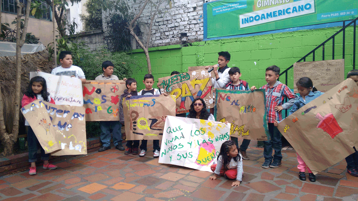 CEPALC - photo of children from Colombia with paintings