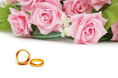 Wedding rings and roses